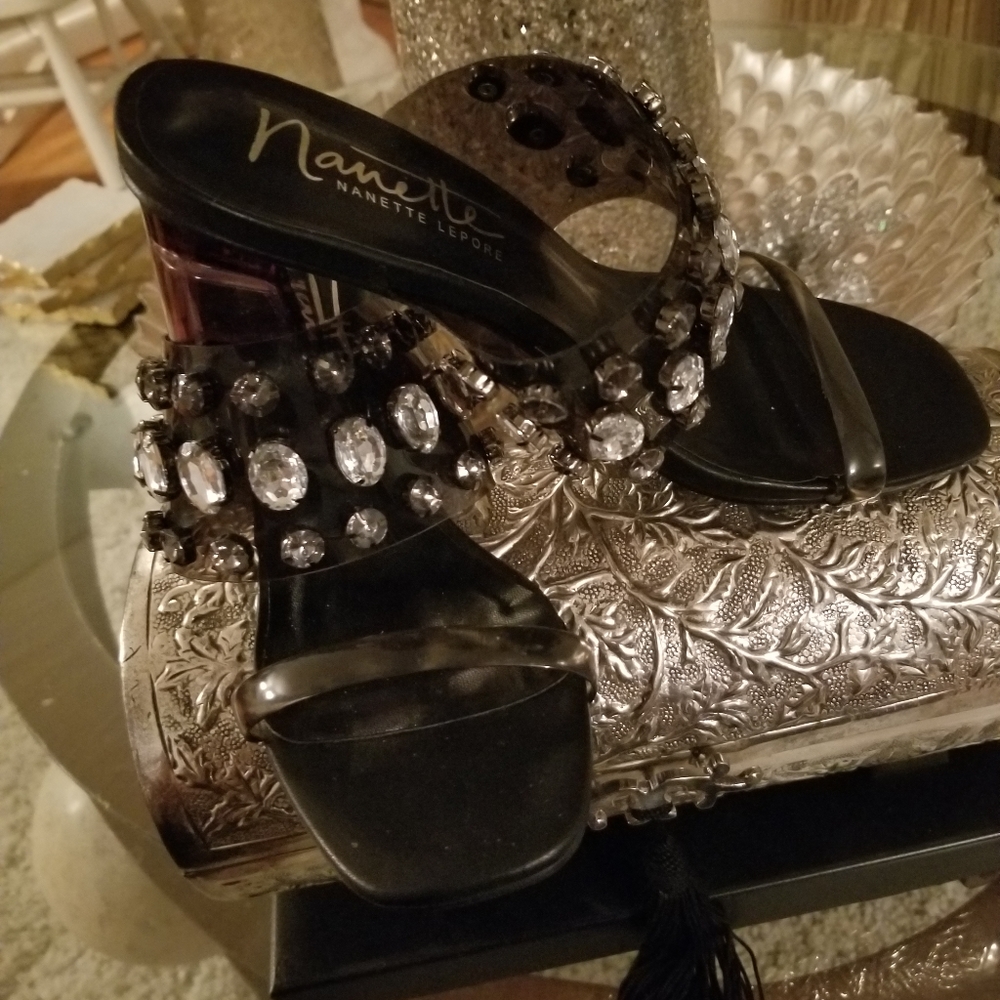 New! Super cute and effortlessly stylish. Bejeweled clear heel mule.
